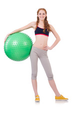 Woman exercising with swiss ball on white