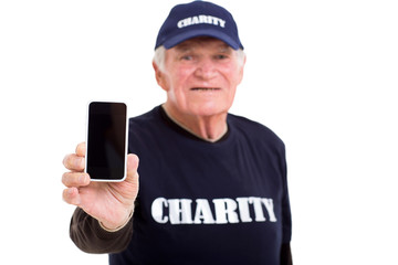 elderly charity volunteer showing smart phone