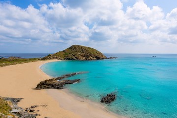 Fototapeta na wymiar Menorca Cala Sa Mesquida Mao Mahon turquoise beach