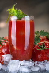 fresh tomato juice with basil, on ice