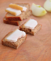 Bacon and bread on the board.