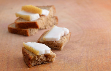 Bacon and bread on the board.