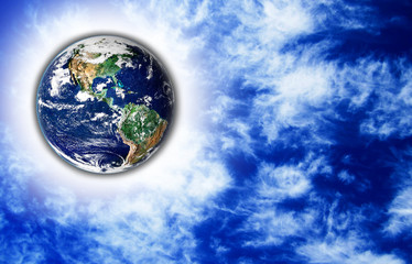 Obraz na płótnie Canvas The Earth with light beam and sky in background