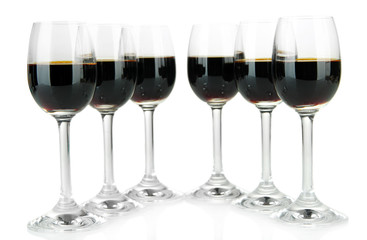 Glasses of liquor, isolated on white