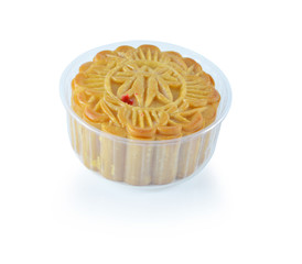 Moon cakes in a clear plastic cup.