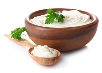 Sour cream isolated on white