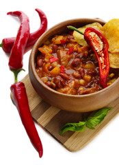Chili Corn Carne - traditional mexican food, in wooden bowl,