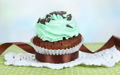 Tasty cupcake on table close up