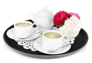 Cups of coffee on tray isolated on white