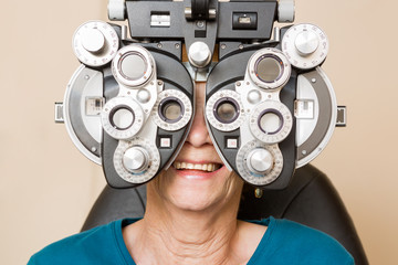 Happy Woman Having An Eye Test