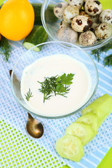 Cucumber yogurt in glass bowl,