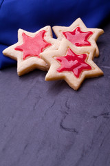 christmas star cookies with red jelly