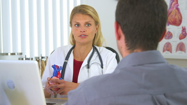 Doctor explaining patient's current heart condition