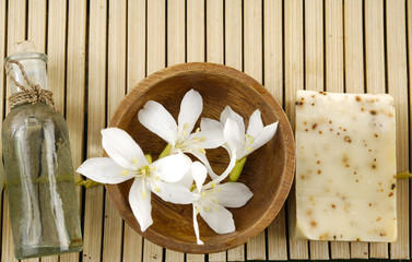 Bar of natural handmade soap with massage oil ,flower