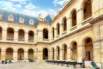 Cannons (guns) in courtyard of Les Invalides hotel . Paris, Fran