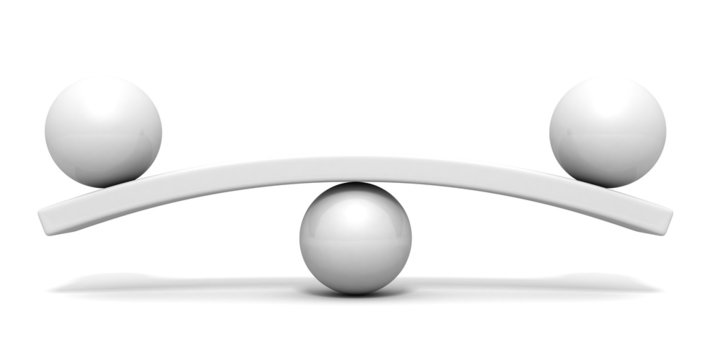 Two white spheres scale balance concept