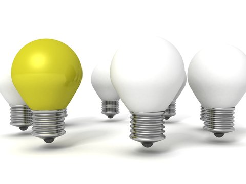 green individual light bulb out from round crowd