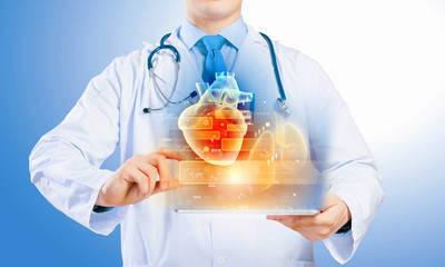 Doctor holding tablet pc