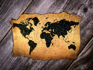 Antique world map on desk