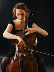 Beautiful female playing the cello