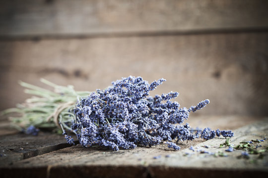 Bunch Of Lavender Flowers On An Old Wood Table