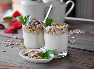 small glasses of plain yogurt with muesli