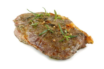 Grilled pork neck steak marinated in herbs