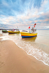 Fishing boats on the beach of Baltic Sea in Poland - obrazy, fototapety, plakaty
