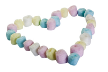 Close-up of a heart shape made from colorful cotton balls