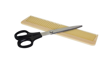 Close-up of a comb with scissors