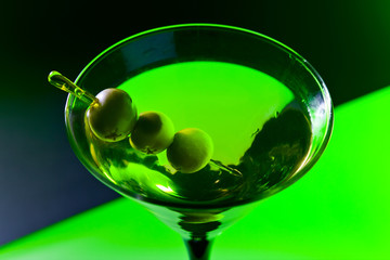 martini with green olives