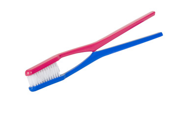 Close-up of two toothbrushes depicting togetherness