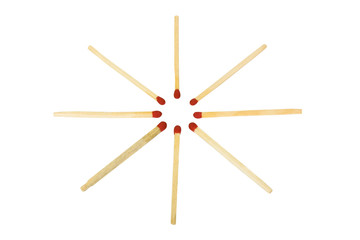 Close-up of matchsticks in a circle
