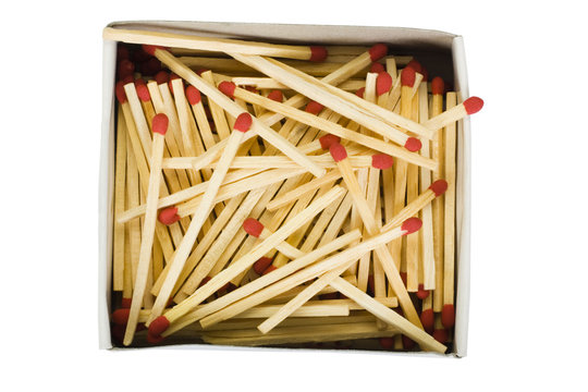 Close-up of an open matchbox with matchsticks