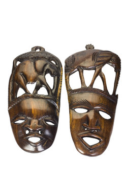 Close-up of two wooden masks