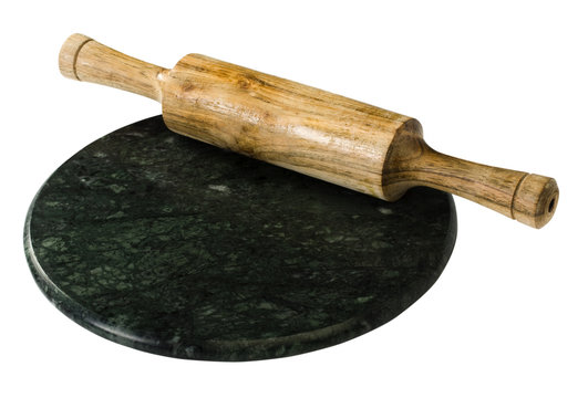Close-up of a rolling pin with a chakla used for rolling kneaded dough into chapatis (flatbread)