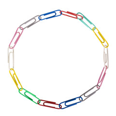 Assorted paper clips arranged in a circular shape