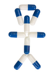 Close-up of capsules representing human