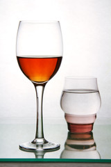 two glasses with drinks.