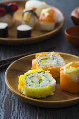 sushi assortments on a plate