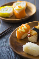 sushi assortments on a plate