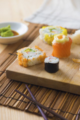 sushi assortments on a plate