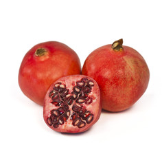Close-up of three pomegranates