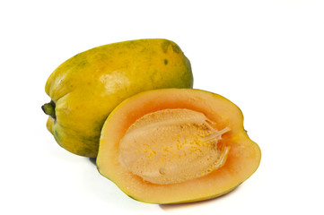 Close-up of a papaya with its half