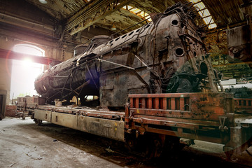 Old industrial locomotive in the garage