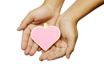 Obraz premium Human Hand Holding Heart Shape Wooden Sign