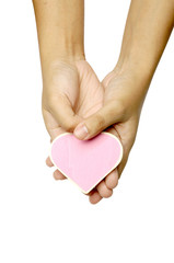 Obraz premium Human Hand Holding Heart Shape Wooden Sign