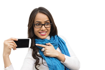 Smiling woman pointing at a mobile phone