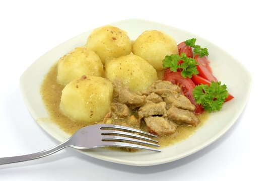 pork in sauce with dumplings