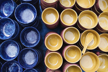 Display of bowls for sale at market stall